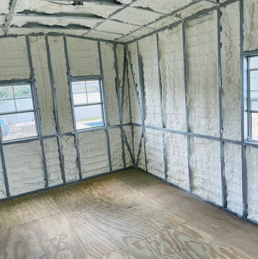 Closed-cell spray foam insulation applied to wall cavities in a residential project in Chartiers